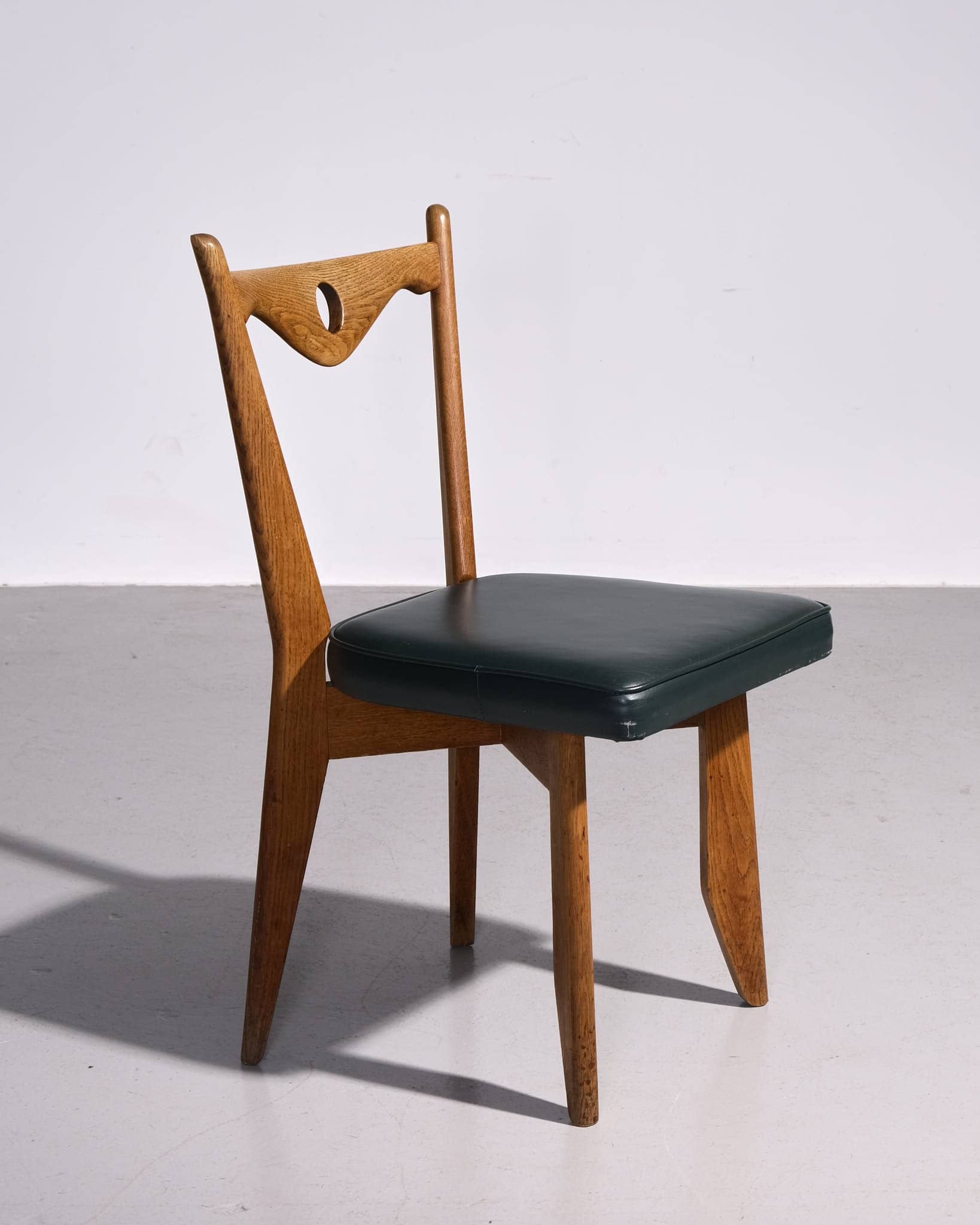 Pair of Dining Chairs with Circle Cut Out
