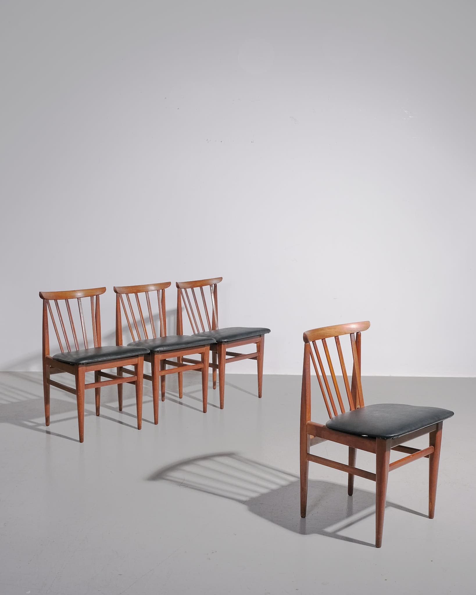 Set of Four Teak and Leather Dining Chairs