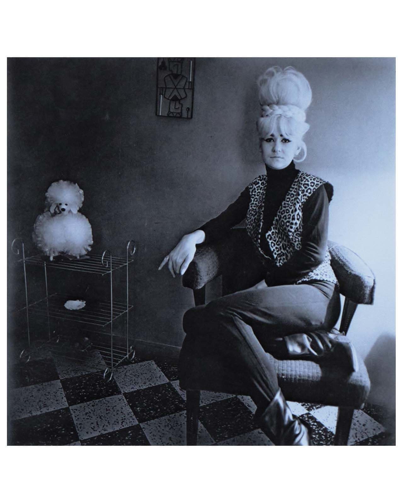 Lady Bartender at Home With a Souvenir