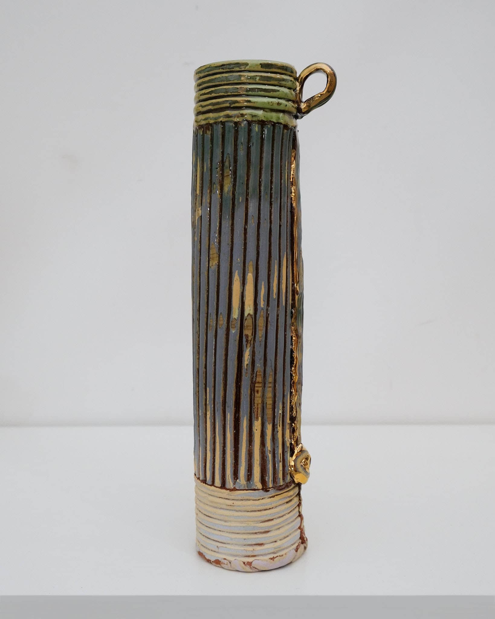 Tall corrugated vase