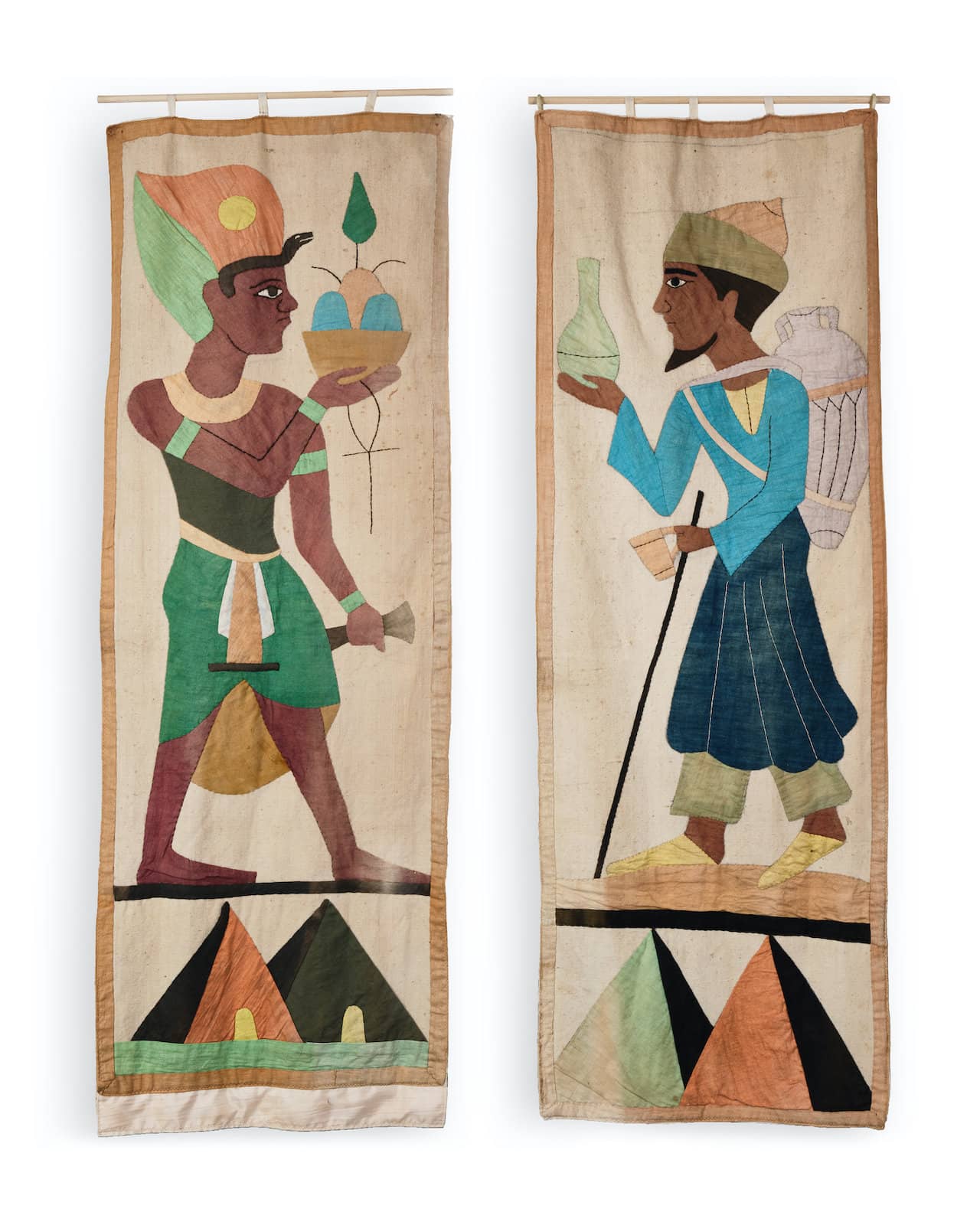 Pair of large appliqué wall hangings