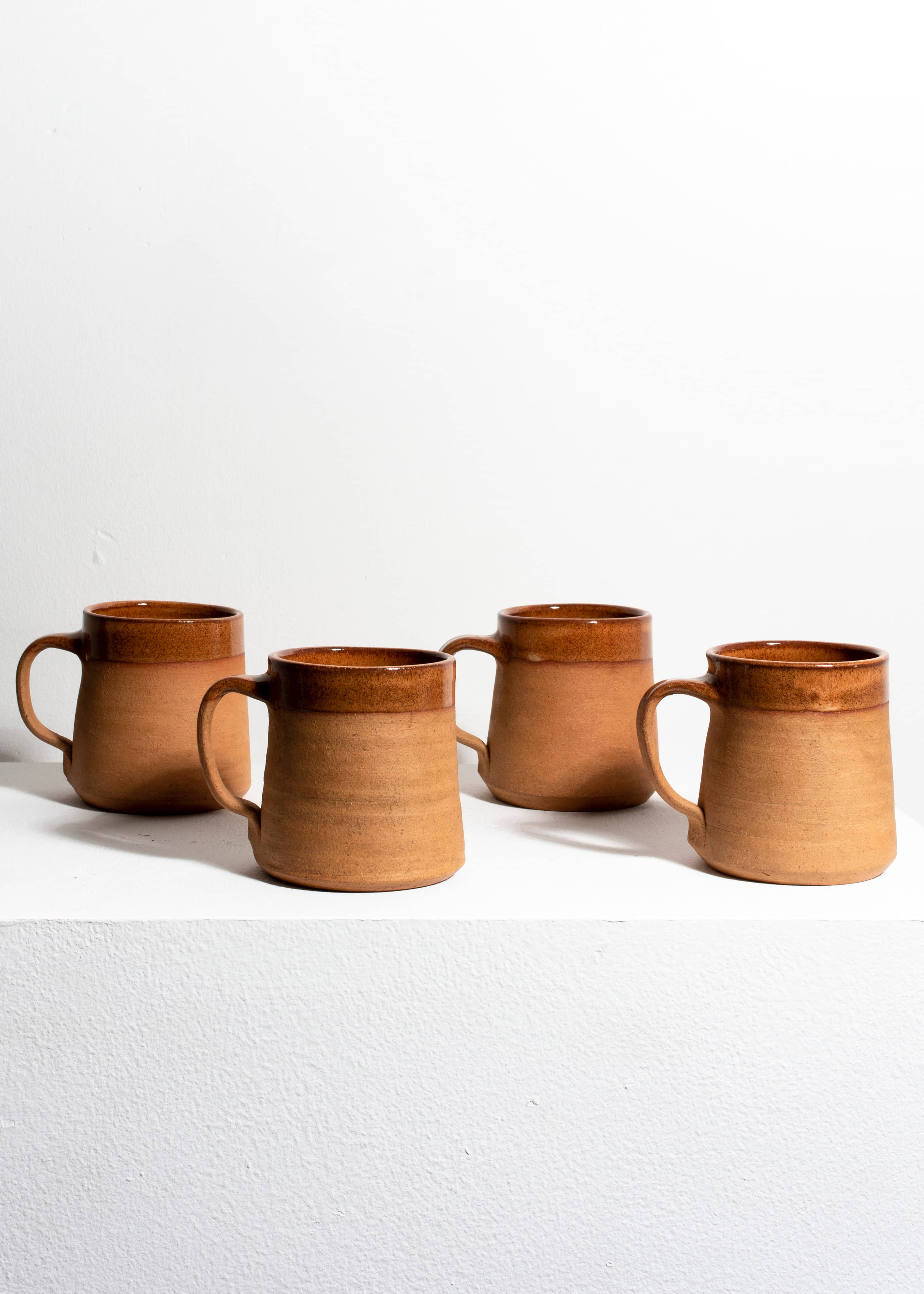 Four small mugs