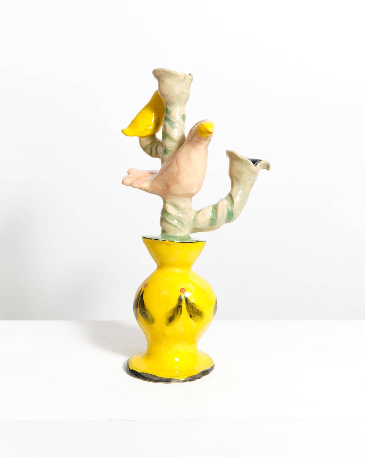 Pair of pink and yellow bird candleholders