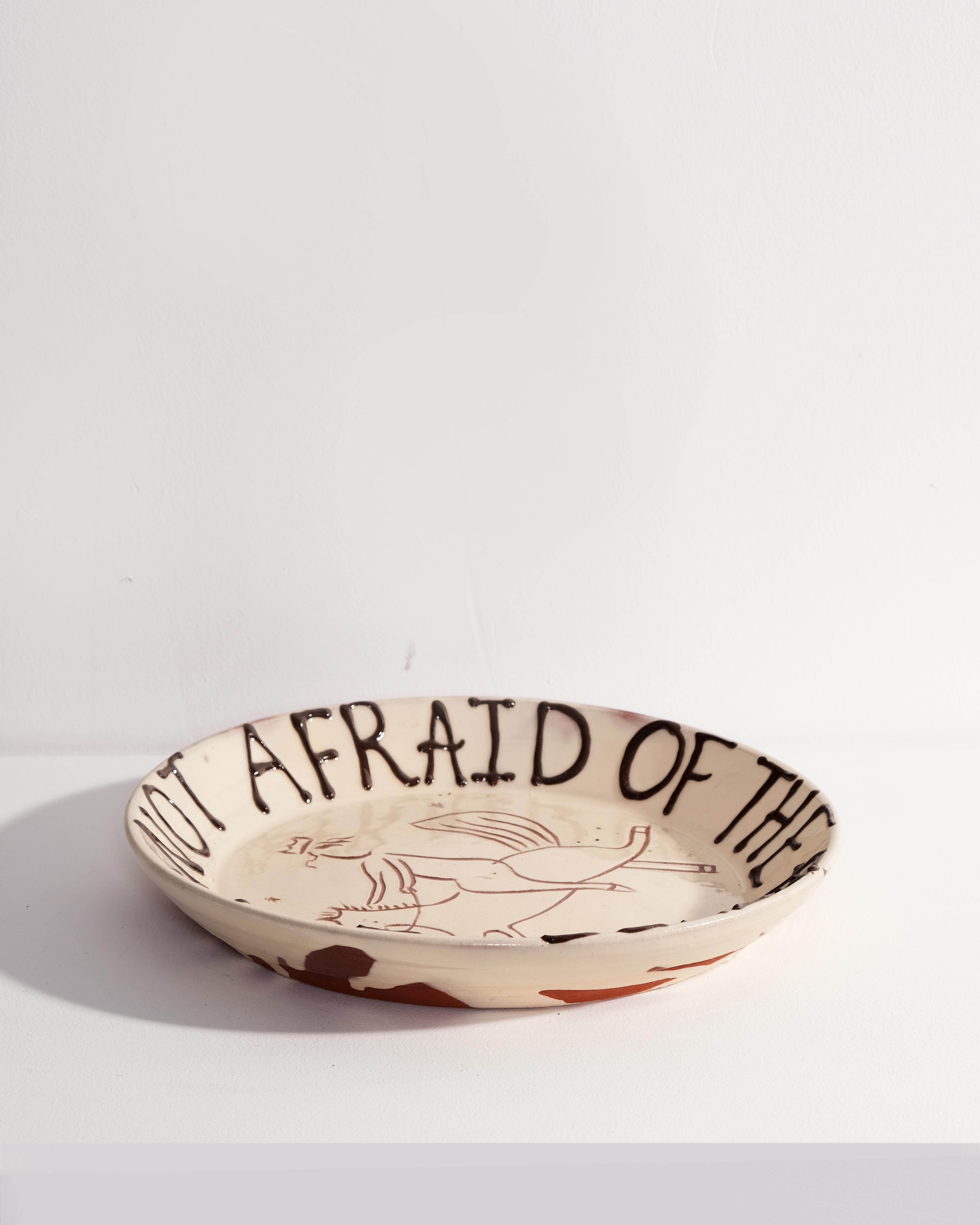 Large Plate with 'I am not afraid of the future' and Person Riding Horse Design